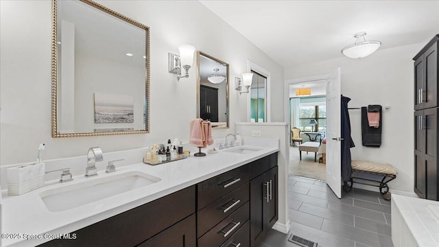 3794 Rambling Acres Dr, Titusville, FL 32796 - full bath featuring tile patterned floors, visible vents, a sink, and double vanity