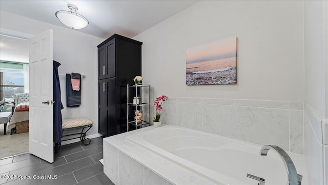 3794 Rambling Acres Dr, Titusville, FL 32796 - full bath featuring tile patterned flooring, a bath, and ensuite bathroom