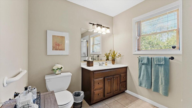 3794 Rambling Acres Dr, Titusville, FL 32796 - bathroom with toilet, a shower with shower door, vanity, baseboards, and tile patterned floors