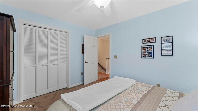 3794 Rambling Acres Dr, Titusville, FL 32796 - carpeted bedroom featuring a ceiling fan, a closet, and baseboards