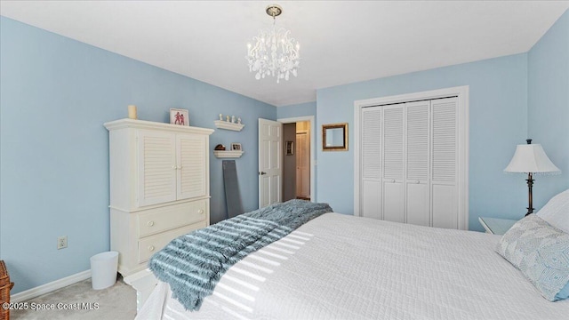 3794 Rambling Acres Dr, Titusville, FL 32796 - bedroom featuring carpet floors, an inviting chandelier, baseboards, and a closet