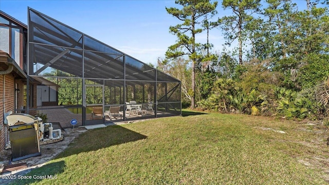 3794 Rambling Acres Dr, Titusville, FL 32796 - view of yard featuring a lanai and a patio area