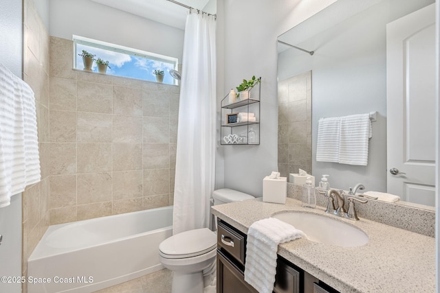 full bathroom featuring shower / tub combo, vanity, toilet, and tile patterned floors