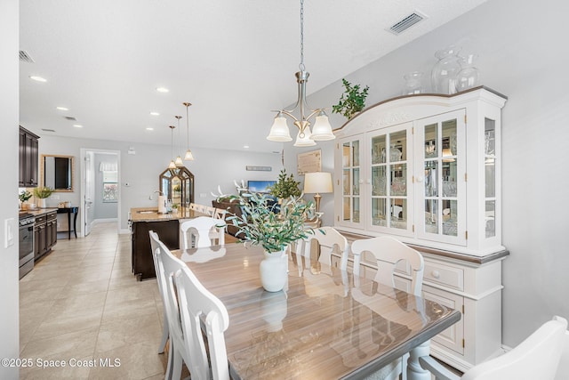 dining room featuring an inviting chandelier, light tile patterned floors, visible vents, and recessed lighting