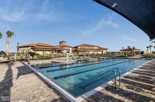 pool with a patio