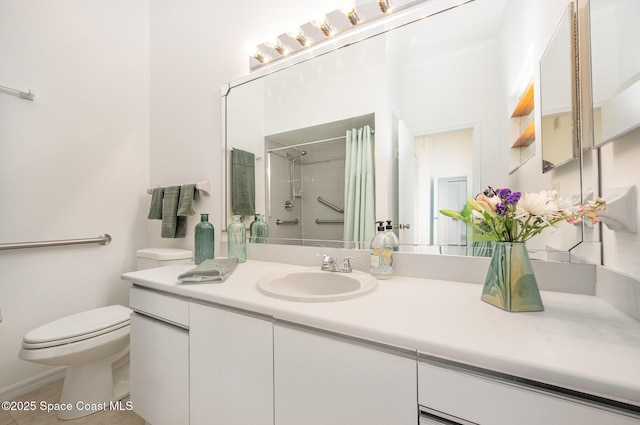 bathroom featuring a shower, toilet, and vanity