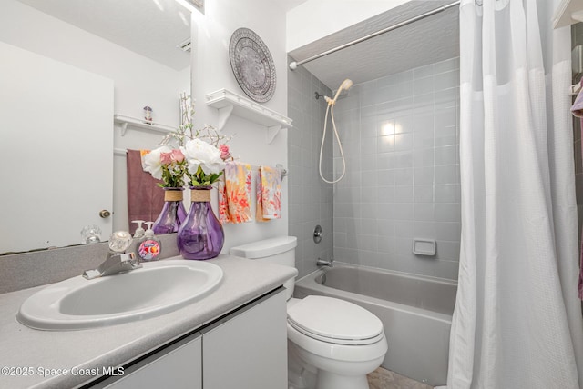 full bathroom featuring toilet, vanity, and shower / bath combo