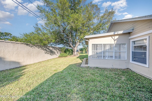 view of yard featuring fence