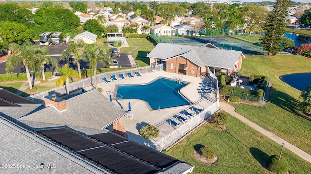 bird's eye view featuring a water view and a residential view