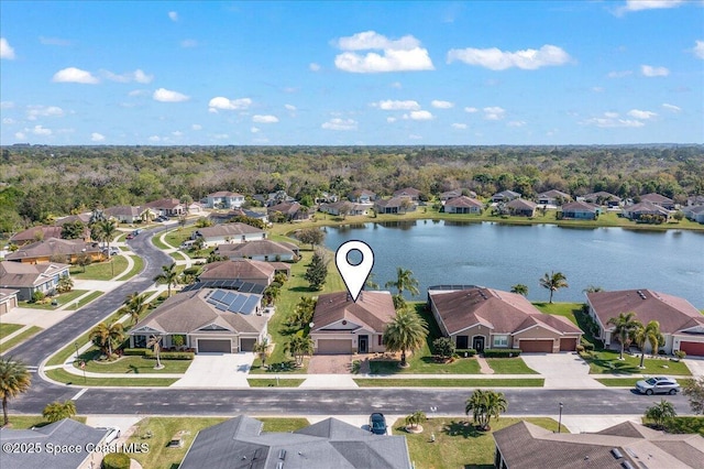 bird's eye view with a water view and a residential view