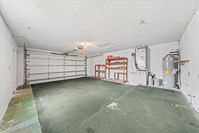 garage with a garage door opener and electric water heater