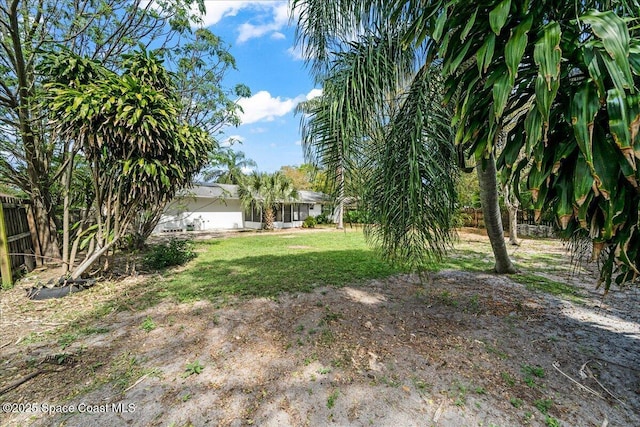 view of yard with fence