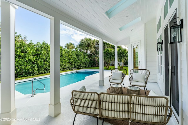 outdoor pool with a patio