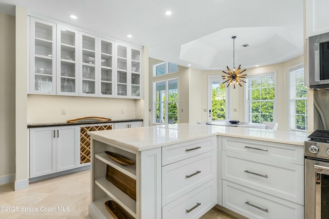 kitchen featuring white cabinets, appliances with stainless steel finishes, open shelves, and recessed lighting