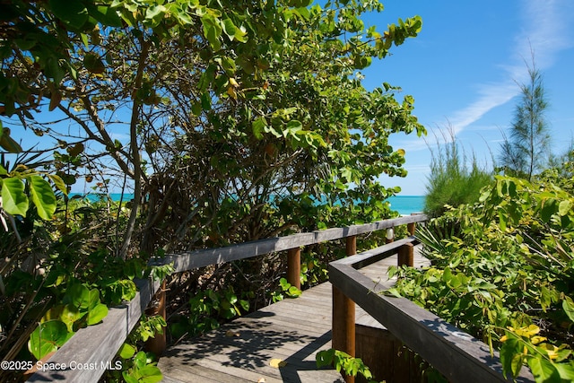 deck featuring a water view