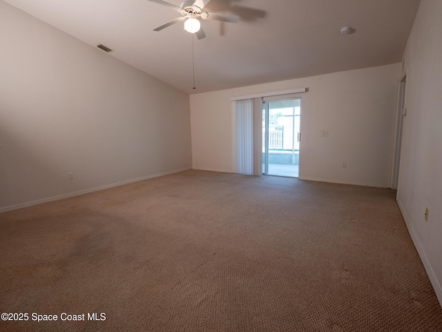 empty room featuring ceiling fan, baseboards, visible vents, and light colored carpet