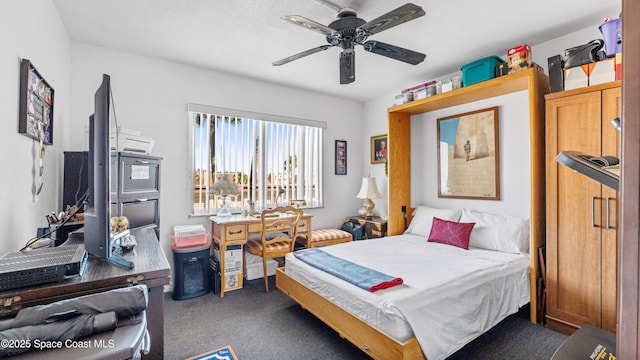 bedroom with carpet floors and a ceiling fan