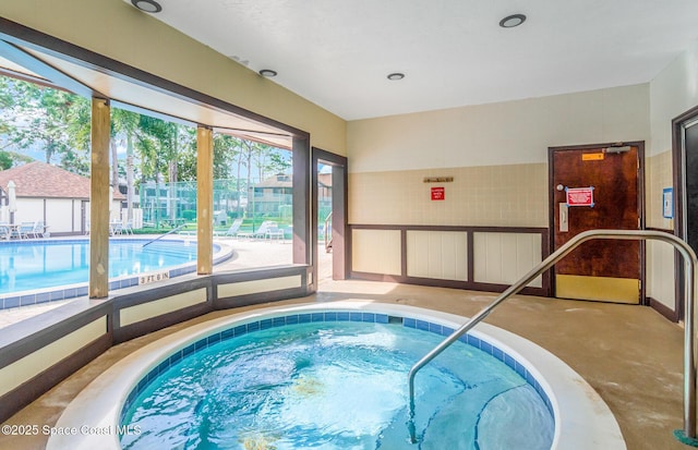 view of pool featuring an indoor in ground hot tub