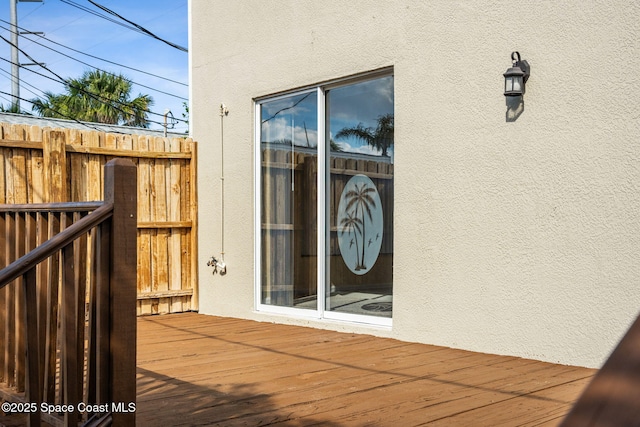 doorway to property with stucco siding