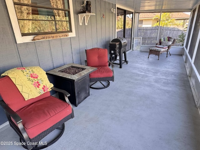 view of patio featuring a fire pit and area for grilling