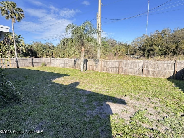 view of yard featuring a fenced backyard