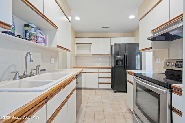 kitchen featuring open shelves, stainless steel appliances, visible vents, a sink, and under cabinet range hood