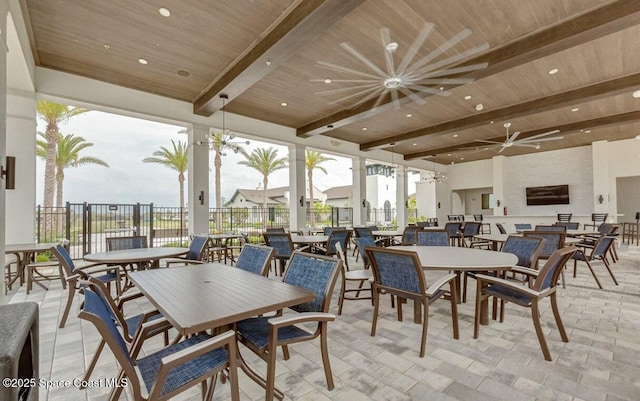 dining room with wooden ceiling, plenty of natural light, recessed lighting, and beam ceiling