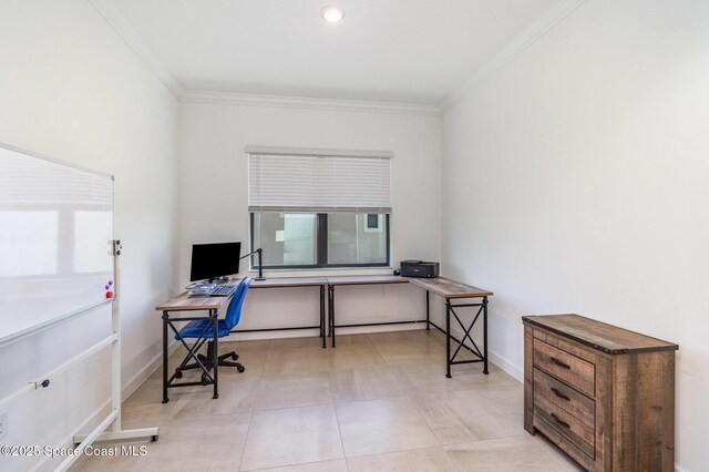 office area featuring baseboards, a wealth of natural light, and ornamental molding