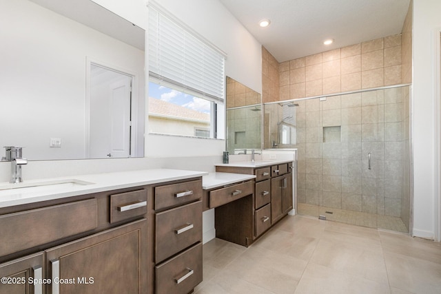 full bathroom with tile patterned floors, recessed lighting, a stall shower, and vanity