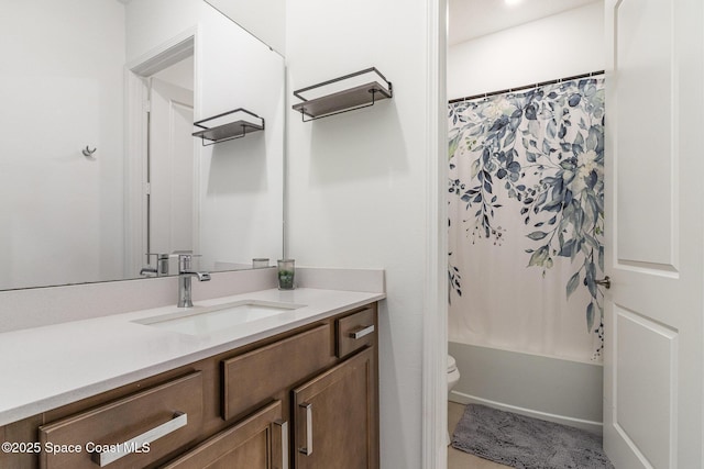 full bathroom featuring vanity, toilet, and shower / bathtub combination with curtain