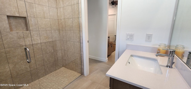 bathroom with vanity and a stall shower