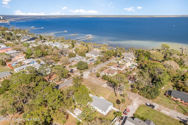 aerial view featuring a water view and a residential view