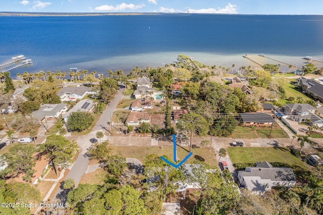 bird's eye view with a water view and a residential view