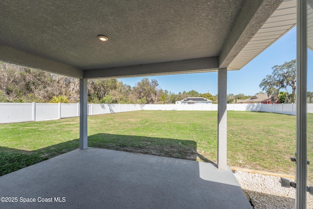 view of patio with a fenced backyard