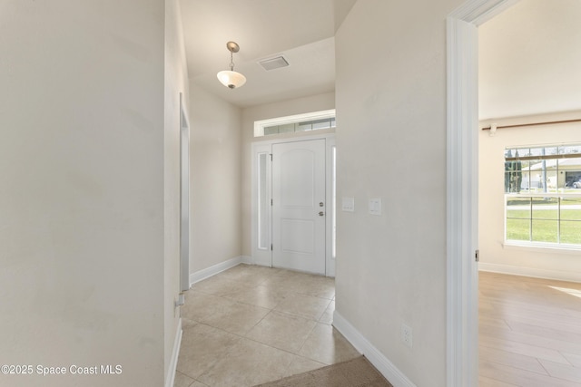 entrance foyer with visible vents and baseboards