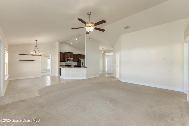 unfurnished living room featuring light carpet, baseboards, visible vents, and ceiling fan with notable chandelier