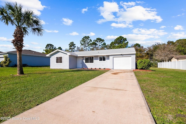 single story home featuring an attached garage, fence, a front lawn, and concrete driveway