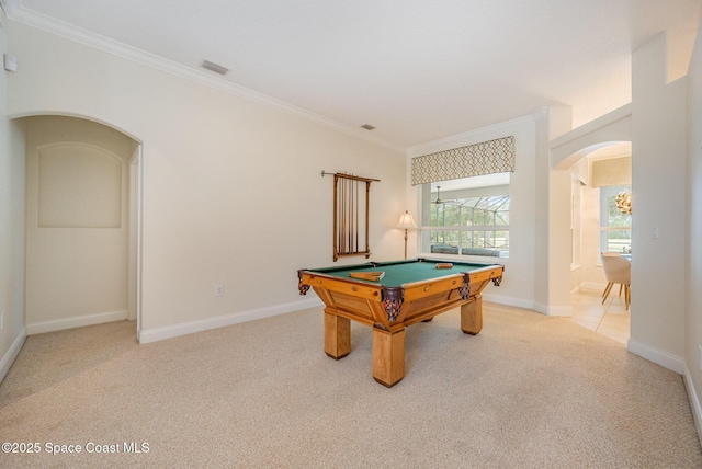 recreation room featuring arched walkways, crown molding, pool table, visible vents, and carpet flooring