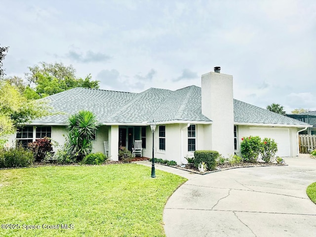 ranch-style house featuring a chimney, a shingled roof, a garage, driveway, and a front lawn