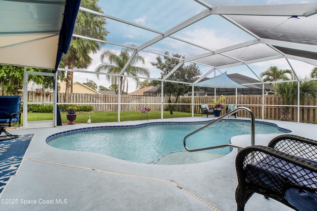 view of swimming pool with a patio area, a fenced backyard, a fenced in pool, and a yard