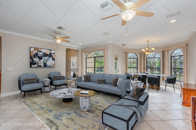 living room featuring plenty of natural light, visible vents, and light tile patterned flooring