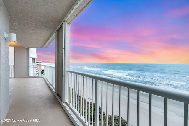 balcony at dusk with a water view