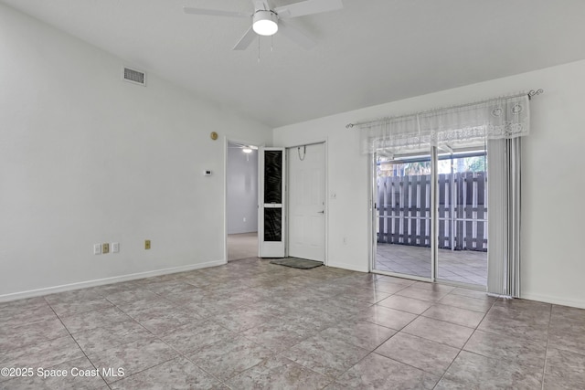 tiled spare room with baseboards, visible vents, and a ceiling fan