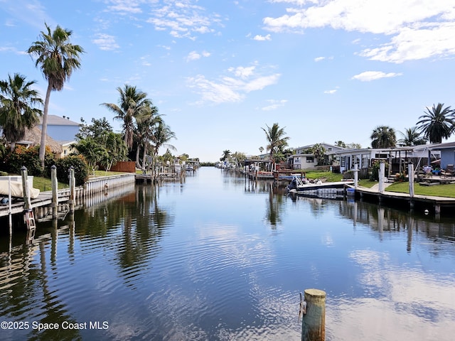 view of water feature featuring a residential view and a boat dock