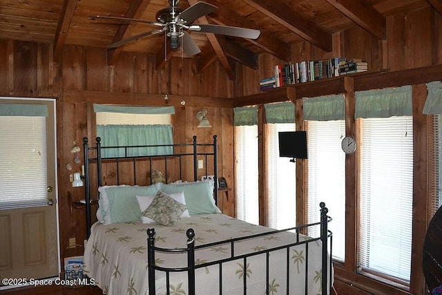 bedroom featuring wooden ceiling, wooden walls, and lofted ceiling with beams