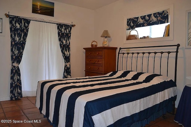 bedroom featuring tile patterned floors