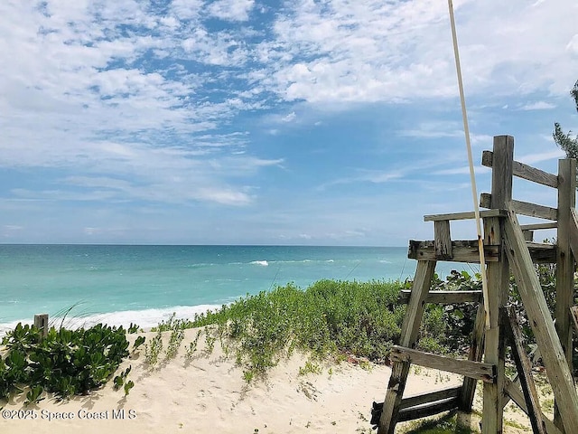 property view of water featuring a view of the beach