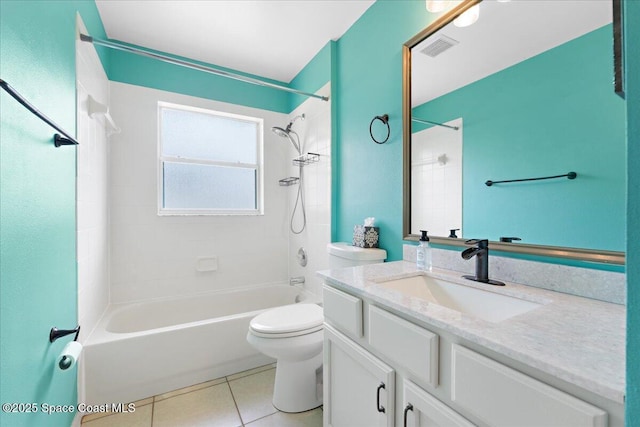 full bath featuring toilet, visible vents, vanity, shower / washtub combination, and tile patterned floors