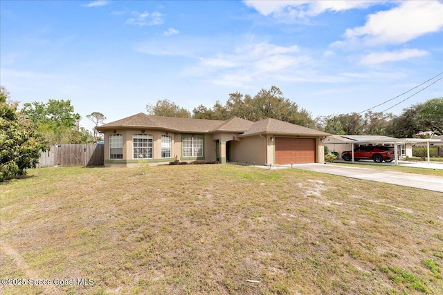 single story home featuring driveway, an attached garage, fence, and a front yard