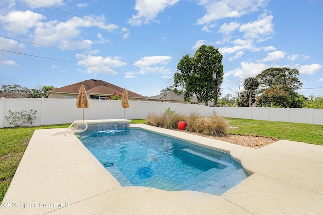 view of swimming pool featuring a fenced in pool, a patio area, a fenced backyard, and a lawn